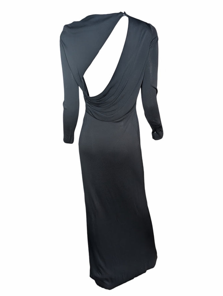 Black evening gown with a draped design on a white background