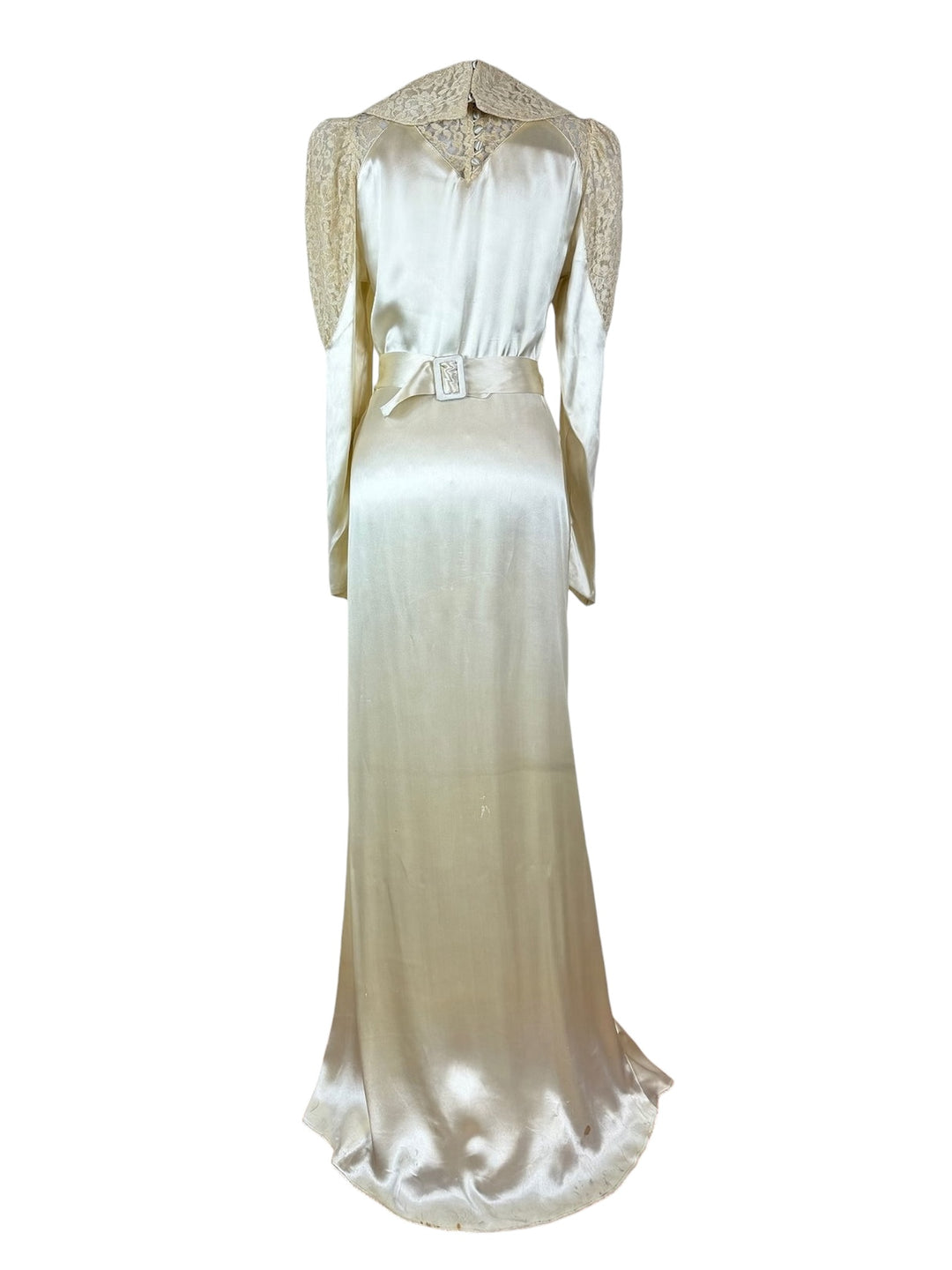 Elegant dress with lace details on a white background