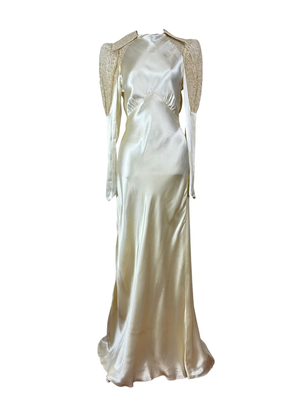 Elegant white satin evening gown with beaded shoulder details on a white background