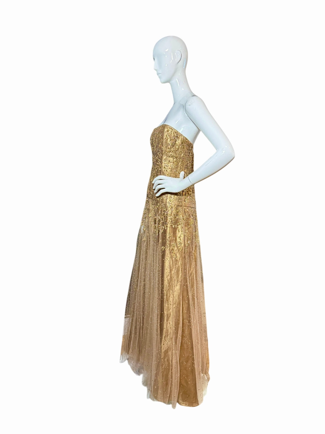 Unworn Ralph Lauren Fall 2006 strapless gold couture gown displayed on mannequin with hand-beaded floral embroidery and full tulle skirt side view