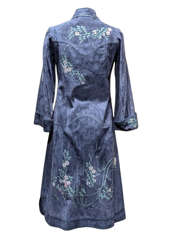 A dark blue-gray velvet long coat with floral embroidery on the back and sleeves, shown against a plain white background.ROBERTO CAVALLI RERACKED VOGUE 1970'S PAINTED SUEDE COLLECTION RARE - FASHION HISTORY MET MUSEUM