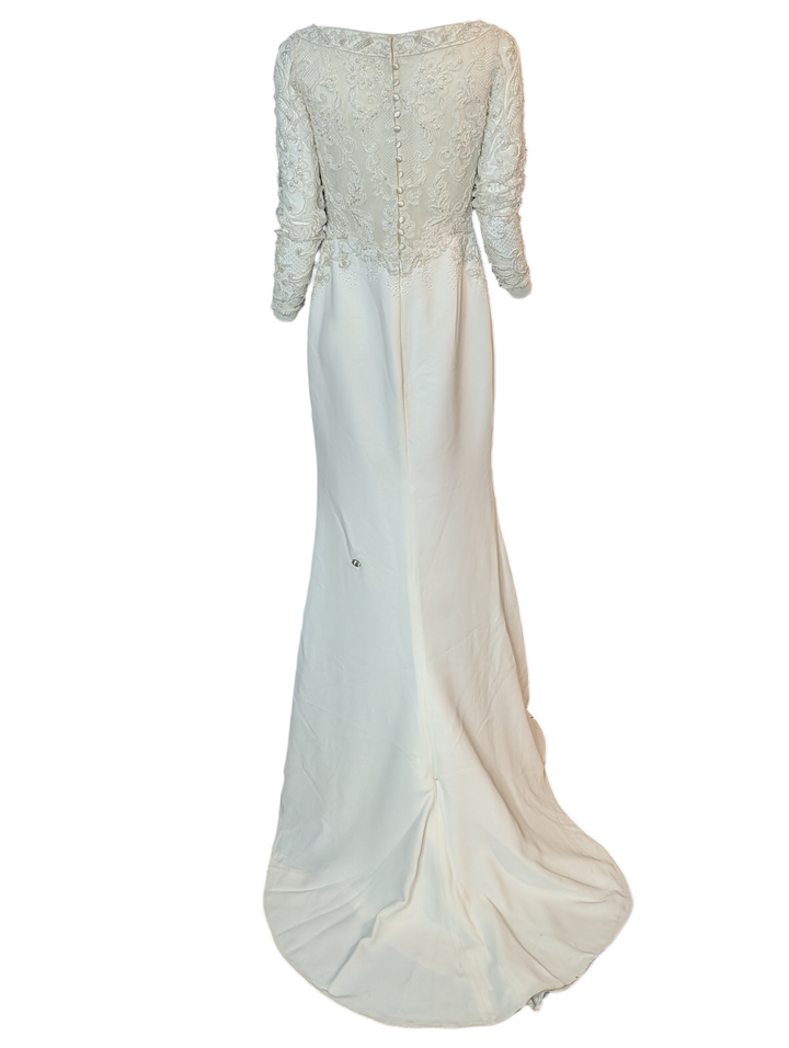 Back view of Badgley Mischka 1990s beaded lace wedding gown with button closure and embroidered bodice