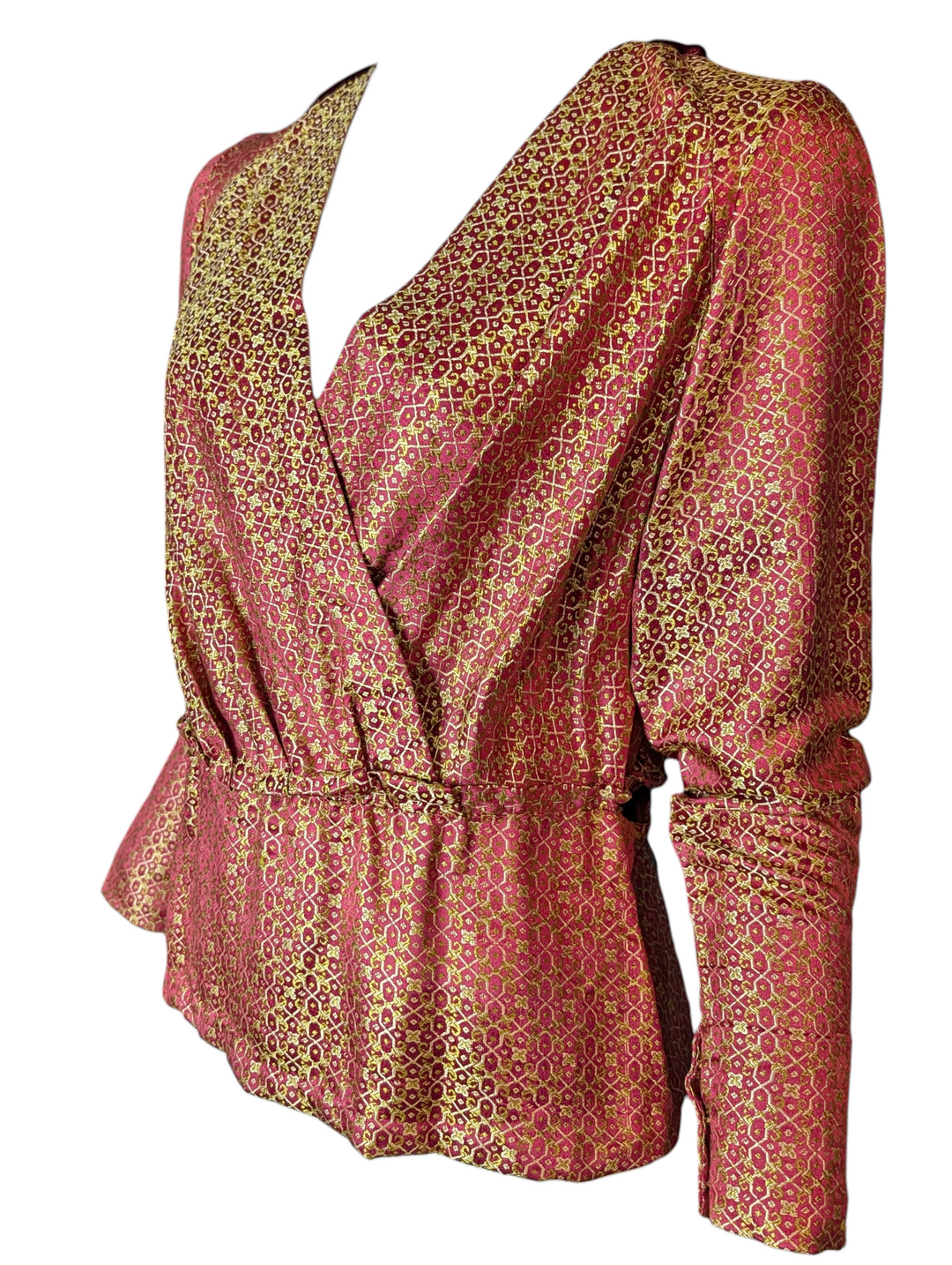 Detail of vintage silk jacquard fabric showing gold geometric pattern