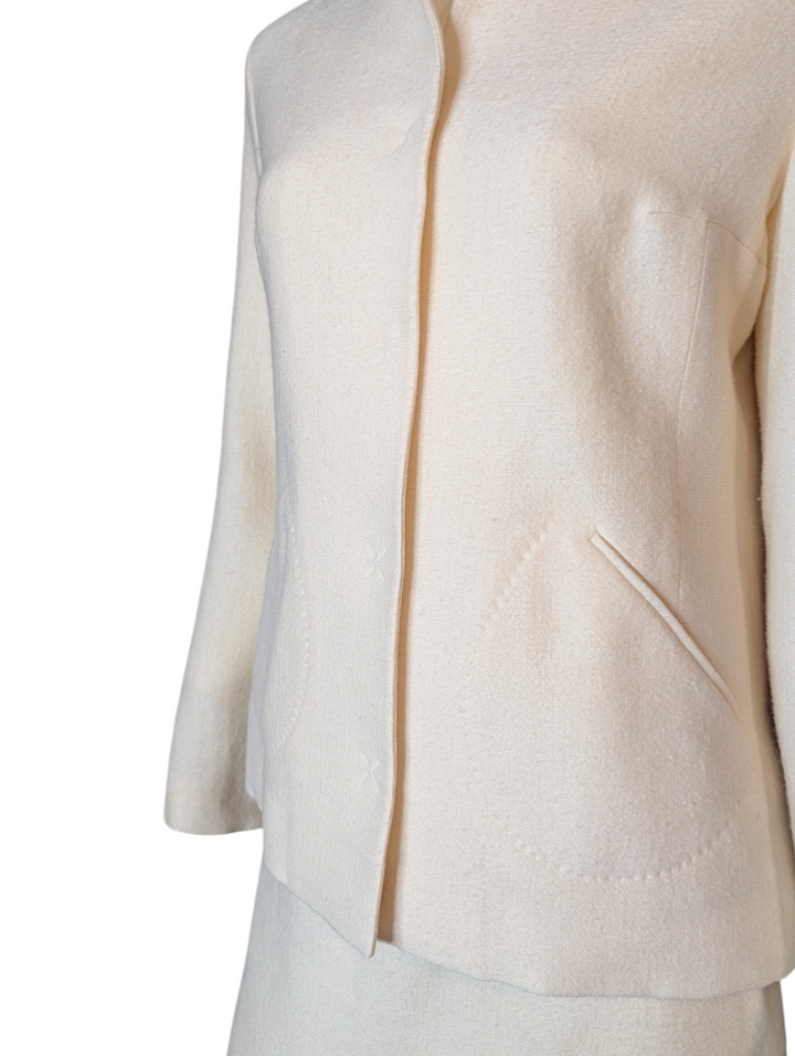 Side detail of Lanvin Paris ivory wool jacket highlighting subtle pocket and structured fit