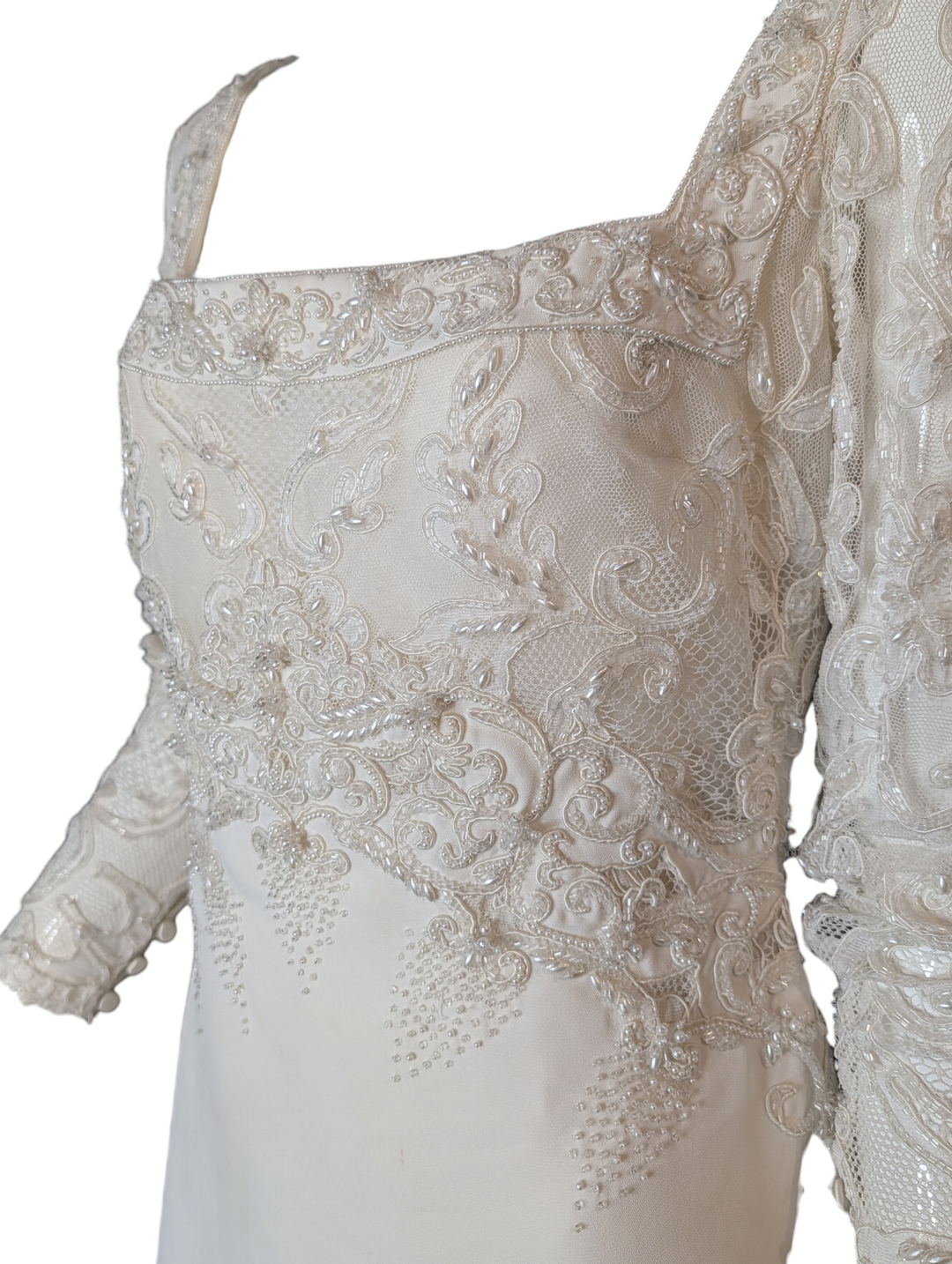 Square neckline and sheer lace sleeves on 1990s Badgley Mischka wedding gown