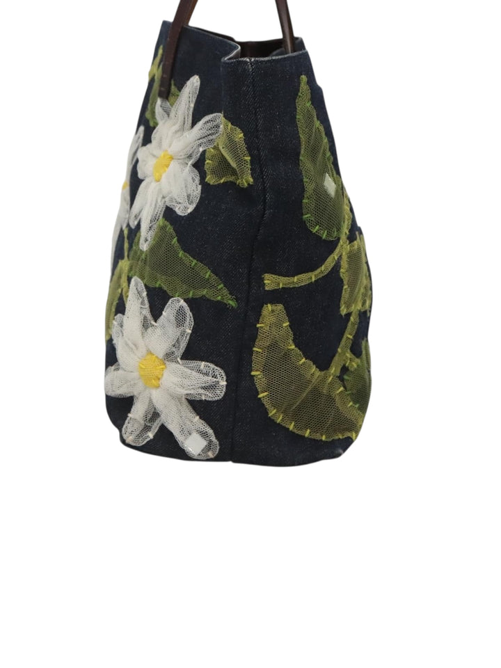 1990s Fendi Daisy Appliqué Denim Tote with Leather Handles - Aesthetic close-up focusing on its vintage charm.