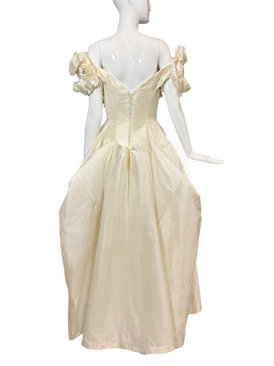 Back view of the vintage Priscilla of Boston wedding gown featuring covered buttons and an elegant chapel-length train, a stunning vintage wedding gown option.
