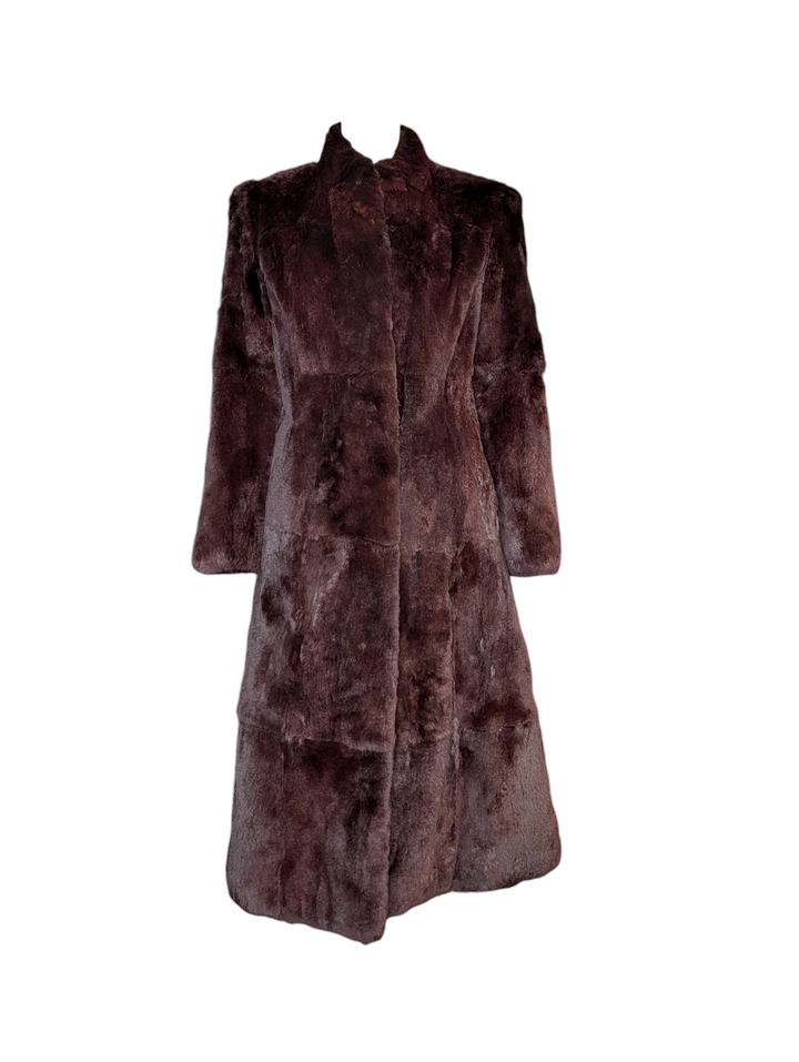 Brown fur coat on a white background